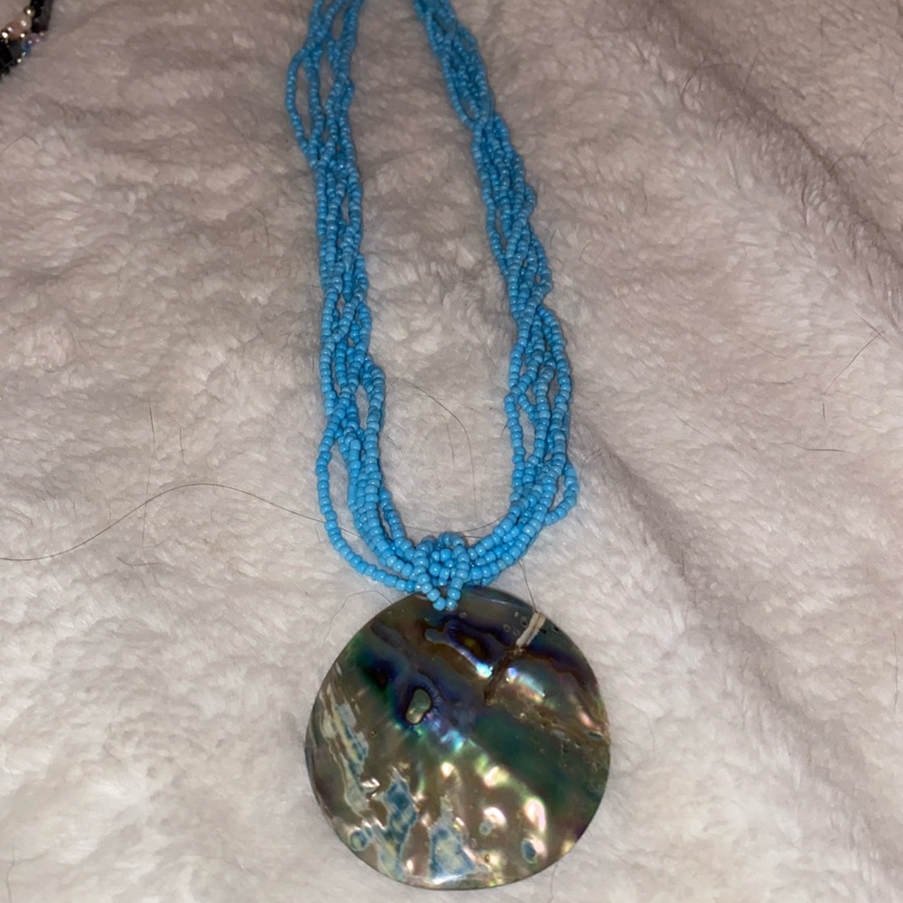 6 strands beaded and inter twined , twist withh abalone shell